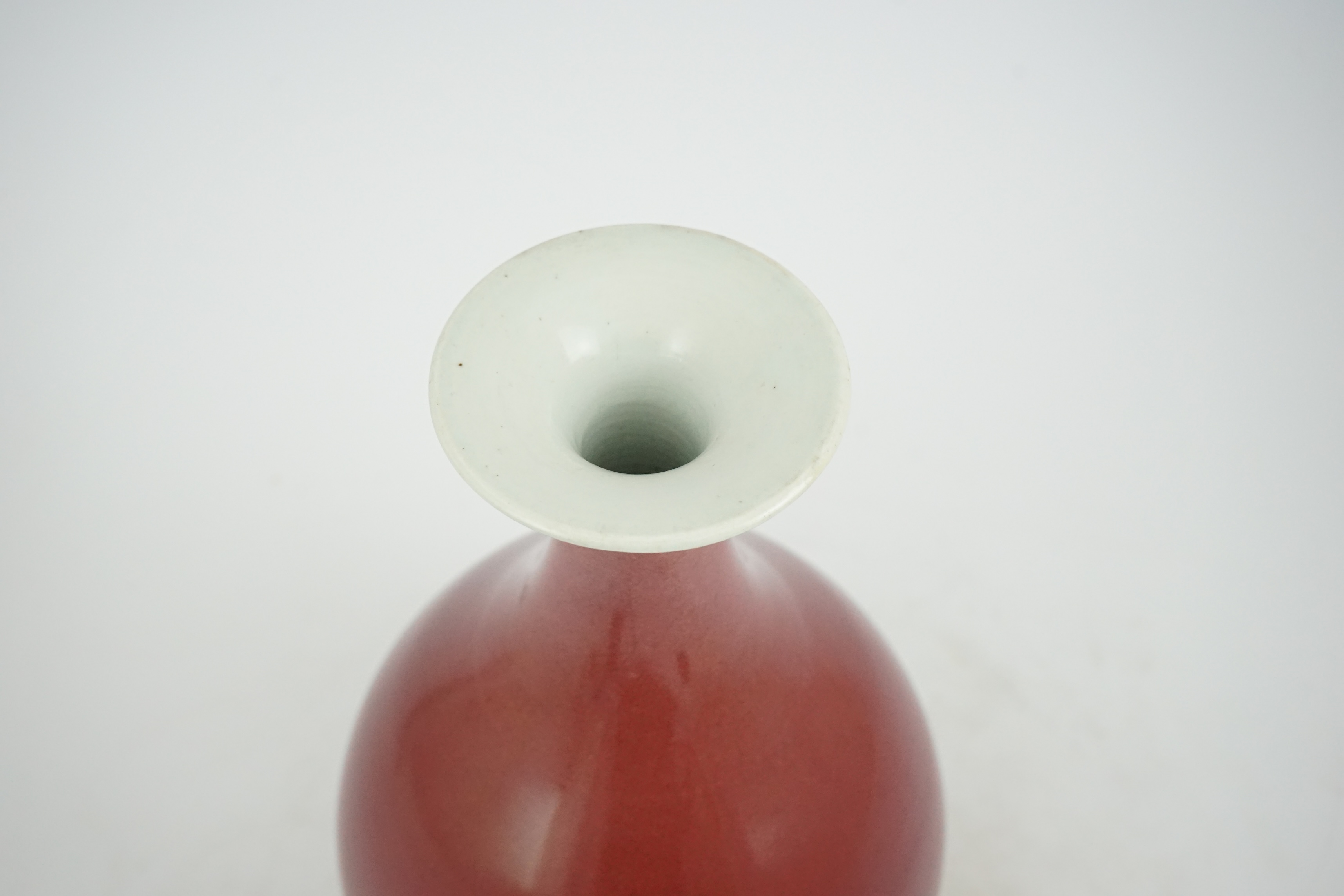 A Chinese sang-de-boeuf glazed pear shaped vase, yuhuchunping, 18th century